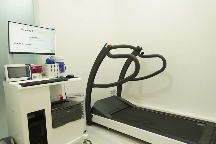 ATA Medical treadmill stress test machine with ECG monitoring equipment used to assess heart function during exercise.