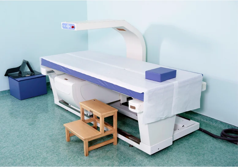Bone density test machine (DEXA scan) used to measure bone mineral density, assess osteoporosis risk, prevent fractures, and monitor bone health.