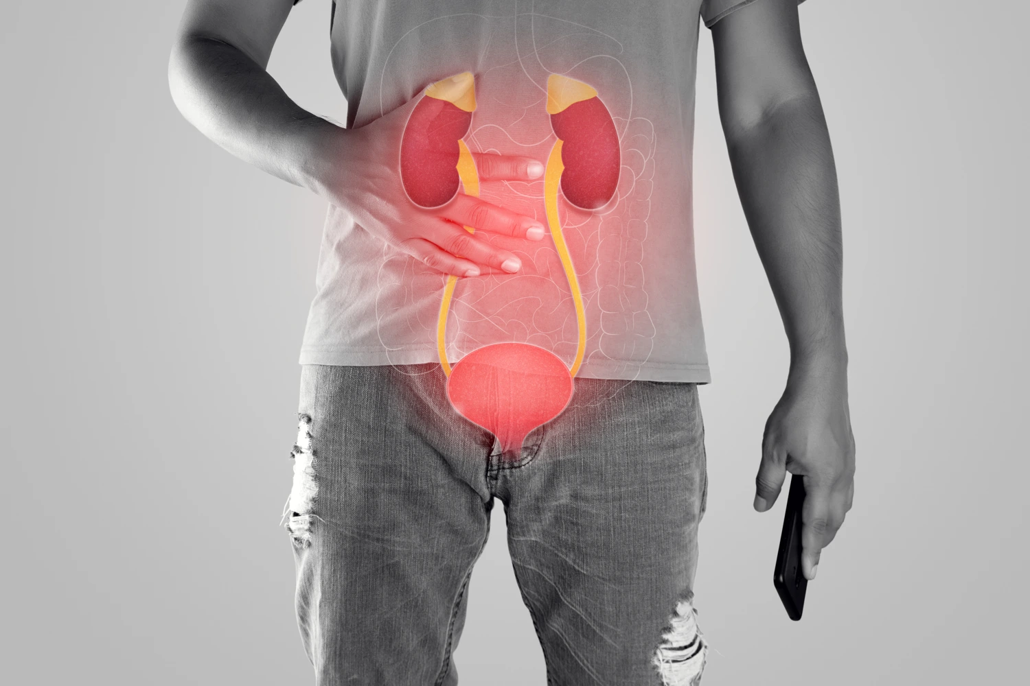 Man experiencing pain in his kidney area which may indicate kidney issues or disease.
