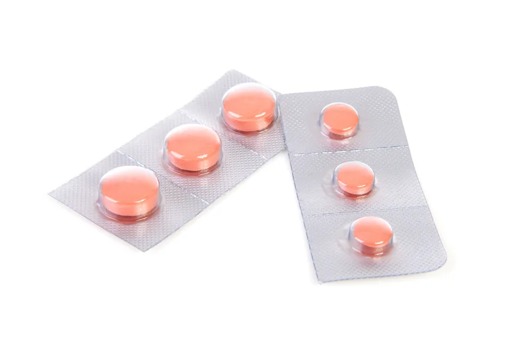 Blister packs of malaria pills used to prevent and treat infection during travel to endemic regions.
