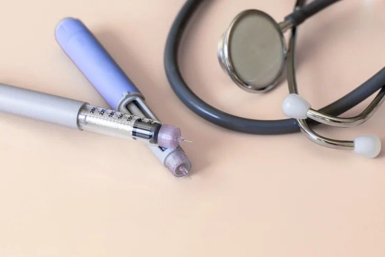 Semaglutide injectable pens with stethoscope showing treatment options for diabetes and weight loss.